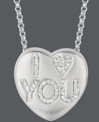 Sugary sweet and perfectly sentimental. Sweethearts' adorable heart-shaped pendant expresses more that just great style with the words I LOVE YOU spelled out in round-cut diamonds (1/8 ct. t.w.) across the surface. Pendant crafted in sterling silver. Copyright © 2011 New England Confectionery Company. Approximate length: 16 inches + 2-inch extender. Approximate drop: 5/8 inch. Sugary sweet and perfectly sentimental. Sweethearts' adorable heart-shaped pendant expresses more that just great style with the words I LOVE YOU spelled out in round-cut diamonds (1/8 ct. t.w.) across the surface. Pendant crafted in sterling silver. Copyright © 2011 New England Confectionery Company. Approximate length: 16 inches + 2-inch extender. Approximate drop: 5/8 inch.