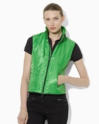 Updated in a bright, bold hue, this lightweight vest delivers performance-driven potential and just enough warmth to keep you comfortable on the green. Updated in a bright, bold hue, this lightweight vest delivers performance-driven potential and just enough warmth to keep you comfortable on the green.
