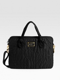This sturdy nylon design with allover logo stitch detail and knotted handles, is a fabulous way to keep your laptop safe.Double top handles, 4 drop Shoulder strap, 9 drop Top zip closure Polyester faux fur lining 15½W X 11H X 1D Imported This sturdy nylon design with allover logo stitch detail and knotted handles, is a fabulous way to keep your laptop safe.Double top handles, 4 drop Shoulder strap, 9 drop Top zip closure Polyester faux fur lining 15½W X 11H X 1D Imported
