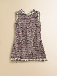 A sophisticated sheath for a chic young lady in a chunky, multicolor tweed with twisted braid trim and a bold back zipper.Round fringed neckline with braided trimSleeveless with fringed, braided trimSlightly fitted through the waistBold contrast back zipperFringed and braided hemSilk lining51% rayon/39% cotton/8% nylon/2% acetateDry cleanImported A sophisticated sheath for a chic young lady in a chunky, multicolor tweed with twisted braid trim and a bold back zipper.Round fringed neckline with braided trimSleeveless with fringed, braided trimSlightly fitted through the waistBold contrast back zipperFringed and braided hemSilk lining51% rayon/39% cotton/8% nylon/2% acetateDry cleanImported
