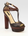 Snake-print leather heel, adjustable straps and platform insert add a dash of luxe to this leather t-strap design. Snake-print leather heel, 5½ (140mm)Island platform with snake-print leather insert, 1½ (40mm)Compares to a 4 heel (100mm)Snake-print leather and leather upperLeather lining and solePadded insoleImportedOUR FIT MODEL RECOMMENDS ordering true size. 