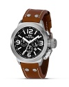 A bold face and leather strap lend classic style to this TW Steel watch with three-eye functionality.