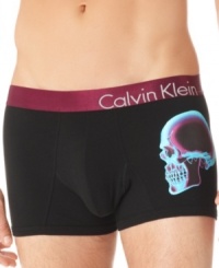 With a body-defining fit and a cool skull x-ray graphic, these Calvin Klein trunks will take your bottom fashion to the top. With a body-defining fit and a cool skull x-ray graphic, these Calvin Klein trunks will take your bottom fashion to the top.