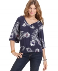 American Rag's slouchy-chic top features a feathery print that adds spice to your skinny jeans or colored cords! American Rag's slouchy-chic top features a feathery print that adds spice to your skinny jeans or colored cords!