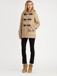 A classic design in pure wool, updated with the Burberry touch.Attached hoodContrast buttons and toggle front closeTwo angle front welt pocketsTwo front patch flap pocketsLong sleeves with button tabsCenter back seam with ventAbout 30 from shoulder to hemWoolDry cleanImportedSIZE & FITModel shown is 5'10½ (179cm) wearing US size 4. This style runs large. We recommend ordering one size down for a standard fit. A classic design in pure wool, updated with the Burberry touch.Attached hoodContrast buttons and toggle front closeTwo angle front welt pocketsTwo front patch flap pocketsLong sleeves with button tabsCenter back seam with ventAbout 30 from shoulder to hemWoolDry cleanImportedSIZE & FITModel shown is 5'10½ (179cm) wearing US size 4. This style runs large. We recommend ordering one size down for a standard fit.