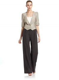 THE LOOKWoven designRuched, padded shouldersLapel with beaded appliquéButton closureThree-quarter length sleeves with gathered, ruched cuffsVent in back hemTHE FITAbout 18½ from shoulder to hemTHE MATERIAL65% linen/35% silkFully linedCARE & ORIGINDry cleanMade in ItalyModel shown is 5'10½ (179cm) wearing US size 4. THE LOOKWoven designRuched, padded shouldersLapel with beaded appliquéButton closureThree-quarter length sleeves with gathered, ruched cuffsVent in back hemTHE FITAbout 18½ from shoulder to hemTHE MATERIAL65% linen/35% silkFully linedCARE & ORIGINDry cleanMade in ItalyModel shown is 5'10½ (179cm) wearing US size 4.