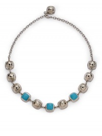 THE LOOKRhodium chain and cushion cut details Cushion cut reconstructed turquoise accentsLobster claspTHE MEASUREMENTLength, about 24ORIGINMade in USA THE LOOKRhodium chain and cushion cut details Cushion cut reconstructed turquoise accentsLobster claspTHE MEASUREMENTLength, about 24ORIGINMade in USA
