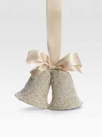 Commemorate everlasting love with this beautiful ornament, made up entirely of dazzling, fine glass glitter.Satin ribbon loopGlass glitter4.5 X 2.55 X 2.5Handmade in USA Commemorate everlasting love with this beautiful ornament, made up entirely of dazzling, fine glass glitter.Satin ribbon loopGlass glitter4.5 X 2.55 X 2.5Handmade in USA