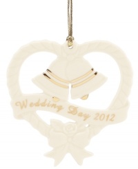 Anticipate a year when wedding and jingle bells will ring with this elegant ornament from Lenox. Sculpted ivory porcelain is dated and detailed in polished gold. Anticipate a year when wedding and jingle bells will ring with this elegant ornament from Lenox. Sculpted ivory porcelain is dated and detailed in polished gold.
