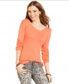 Material Girl's posh sweater features a classic scoop neck in the front and a dramatic deep V-neckline at the back. Pair it with printed skinny jeans for a vibrant look!