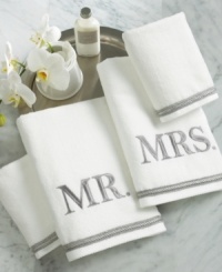 A great gift idea for the newlyweds on your list. This elegant four-piece set includes: Mr. and Mrs. embroidered towels and two hand towels with a decorative border. A great gift idea for the newlyweds on your list. This elegant four-piece set includes: Mr. and Mrs. embroidered towels and two hand towels with a decorative border.
