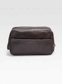 A traveling essential, crafted from rich textured leather.One side handleDouble zip and magnetic closureExterior, interior pocketsRemovable interior bagLeather10W x 6¼H x 4¾DImported A traveling essential, crafted from rich textured leather.One side handleDouble zip and magnetic closureExterior, interior pocketsRemovable interior bagLeather10W x 6¼H x 4¾DImported