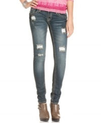 Rock awesome style -- and serious attitude -- in Dollhouse's five-pocket skinny jeans! Sports cool ripped design and a sprinkle of dark studs. Rock awesome style -- and serious attitude -- in Dollhouse's five-pocket skinny jeans! Sports cool ripped design and a sprinkle of dark studs.