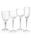 Inspired by the chic London neighborhood, Wedgwood Knightsbridge stemware features a delicately round shape with deep cuts around the bowl. The stem resembles a flower when viewed from above. Wine glass shown second from left.