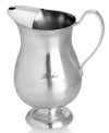 Add antique polish to the buffet table with this Towle pitcher, featuring simply engraved stainless steel with a footed base.