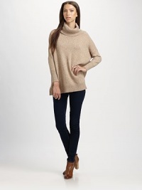 A slouchy marled knit pullover, styled with dropped shoulders and a chunky turtleneck.Dropped shouldersRibbed trimPullover styleAbout 26 from shoulder to hemViscose/nylon/cotton/cashmere/angoraMachine washImportedModel shown is 5'11 (180cm) wearing US size Small. A slouchy marled knit pullover, styled with dropped shoulders and a chunky turtleneck.Dropped shouldersRibbed trimPullover styleAbout 26 from shoulder to hemViscose/nylon/cotton/cashmere/angoraMachine washImportedModel shown is 5'11 (180cm) wearing US size Small.