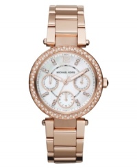 A sweetly feminine watch from Michael Kors with crystal accents for subtle sparkle. A sweetly feminine watch from Michael Kors with crystal accents for subtle sparkle.
