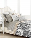 A printed chambray textured stripe creates sophisticated sheeting for the Mont Clair bedding collection. Its distressed colorway of charcoal, flax and ivory create a unique, edgy look that heightens the modern appeal of this stenciled Tommy Hilfiger bedding design. (Clearance)