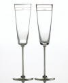 Begin a glorious meal--and life--together with a magical toast. From kate spade, these crystal champagne glasses feature brilliant silver-plated stems and sheer bands with either Mr. or Mrs. engraved on each rim. Coordinates with the rest of the handsome and modern Darling Point collection.