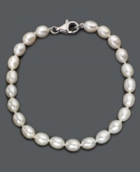 As necessary as a little black dress. This simple sterling silver bracelet features oblong cultured freshwater pearls (6-7 mm). Approximate length: 8 inches. As necessary as a little black dress. This simple sterling silver bracelet features oblong cultured freshwater pearls (6-7 mm). Approximate length: 8 inches.