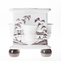 This charming Juliska tulipiere depicts a romantic scene from English country life in traditional ceramic stoneware. This charming Juliska tulipiere depicts a romantic scene from English country life in traditional ceramic stoneware.