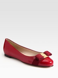 Glossy patent leather classic is a favorite with signature grosgrain bow at the toe. Grosgrain bow and logo hardware at toe Leather lining and sole Made in ItalyOUR FIT MODEL RECOMMENDS ordering true size. Glossy patent leather classic is a favorite with signature grosgrain bow at the toe. Grosgrain bow and logo hardware at toe Leather lining and sole Made in ItalyOUR FIT MODEL RECOMMENDS ordering true size.