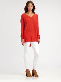 Relaxed-fitting v-neck sweater lends a vibrant pop of color to any casual ensemble.V-neckLong sleeveAbout 28 from shoulder to hemCottonDry cleanImported Model shown is 5'10 (180cm) wearing a US size Small.This style runs true to size. We recommend ordering your usual size for a standard fit. Relaxed-fitting v-neck sweater lends a vibrant pop of color to any casual ensemble.V-neckLong sleeveAbout 28 from shoulder to hemCottonDry cleanImported Model shown is 5'10 (180cm) wearing a US size Small.This style runs true to size. We recommend ordering your usual size for a standard fit.