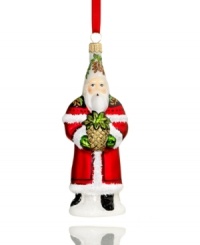 No one welcomes the season like Santa. Bearing a fresh pineapple, St. Nick revives a classic holiday tradition in this mouth-blown, hand-painted glass ornament from Vaillancourt. No one welcomes the season like Santa. Bearing a fresh pineapple, St. Nick revives a classic holiday tradition in this mouth-blown, hand-painted glass ornament from Vaillancourt.