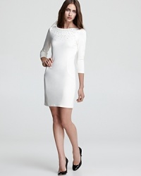Subtle rhinestone embellishments add just the perfect dash of sparkle to this form-fitting, party-perfect Velvet by Graham & Spencer dress. Subtle rhinestone embellishments add just the perfect dash of sparkle to this form-fitting, party-perfect Velvet by Graham & Spencer dress.