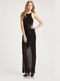 Semi-sheer paneling, racerback and a hint of silk add glamour to this elongated, sultry silhouette. CrewneckSpaghetti strapsFront-to-back semi-sheer panels at waistSemi-sheer hemSilk trimBody; silkCombo; polyesterDry cleanImportedModel shown is 5'10 (177cm) wearing US size Small. Semi-sheer paneling, racerback and a hint of silk add glamour to this elongated, sultry silhouette. CrewneckSpaghetti strapsFront-to-back semi-sheer panels at waistSemi-sheer hemSilk trimBody; silkCombo; polyesterDry cleanImportedModel shown is 5'10 (177cm) wearing US size Small.