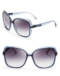 These true blue MICHAEL Michael Kors sunglasses feature fashion-right, oversized frames in a shade well-suited to your denim wardrobe. These true blue MICHAEL Michael Kors sunglasses feature fashion-right, oversized frames in a shade well-suited to your denim wardrobe.