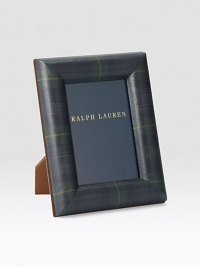 An elegant display for a cherished photo, rendered in supple saddle leather with a nickel-plated brass finish. Holds one 5 X 7 photoLeather and nickel-plated brassImported An elegant display for a cherished photo, rendered in supple saddle leather with a nickel-plated brass finish. Holds one 5 X 7 photoLeather and nickel-plated brassImported