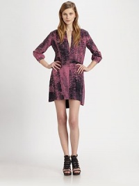 Abstract print, hi-lo hem and a back cutout add an urban-cool feel to this fluid shirtdress. V-neckThree-quarter bishop sleeves with buttoned cuffsHi-low hemBack cutoutAbout 19 from natural waistCuproDry cleanMade in USA of imported fabricModel shown is 5'10 (177cm) wearing US size 2. Abstract print, hi-lo hem and a back cutout add an urban-cool feel to this fluid shirtdress. V-neckThree-quarter bishop sleeves with buttoned cuffsHi-low hemBack cutoutAbout 19 from natural waistCuproDry cleanMade in USA of imported fabricModel shown is 5'10 (177cm) wearing US size 2.