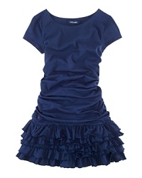 A pretty boat neck dress rendered in soft cotton jersey is updated for a stylish look with ruched detailing and a ruffled hem. A pretty boat neck dress rendered in soft cotton jersey is updated for a stylish look with ruched detailing and a ruffled hem.