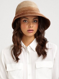 A striking topper crafted in luxurious rabbit felt with an asymmetrical turn-up brim and adjustable inner band.Angora fur feltAdjustable inner bandBrim, about 3.5BrushImportedFur origin: Czech Republic A striking topper crafted in luxurious rabbit felt with an asymmetrical turn-up brim and adjustable inner band.Angora fur feltAdjustable inner bandBrim, about 3.5BrushImportedFur origin: Czech Republic