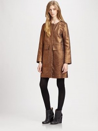 Remarkably elegant, metallic coat in a slightly textured, a-line silhouette with a hidden button front and oversized front flap pockets. RoundneckLong sleevesHidden button frontFront flap pocketsAbout 34 from shoulder to hem38% polyester/21% wool/21% polyacrylic/20% cottonDry cleanMade in USA of Italian fabricModel shown is 5'9½ (176cm) wearing US size XSmall. Remarkably elegant, metallic coat in a slightly textured, a-line silhouette with a hidden button front and oversized front flap pockets. RoundneckLong sleevesHidden button frontFront flap pocketsAbout 34 from shoulder to hem38% polyester/21% wool/21% polyacrylic/20% cottonDry cleanMade in USA of Italian fabricModel shown is 5'9½ (176cm) wearing US size XSmall.
