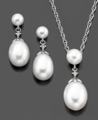 Exquisite cultured freshwater pearls (4-10 mm) dangle glamorously from a sterling silver setting on this enduring pendant and earrings set. Pendant measures approximately 18 inches with a 3/4-inch drop. Earrings measure approximately 3/4-inch. Exquisite cultured freshwater pearls (4-10 mm) dangle glamorously from a sterling silver setting on this enduring pendant and earrings set. Pendant measures approximately 18 inches with a 3/4-inch drop. Earrings measure approximately 3/4-inch.