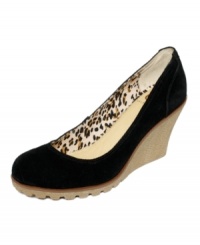 This sleek suede wedge is the ultimate day-to-night shoe. Perfect for the office or an evening out on the town with treaded soles and a subtle, stylish incline. This sleek suede wedge is the ultimate day-to-night shoe. Perfect for the office or an evening out on the town with treaded soles and a subtle, stylish incline.