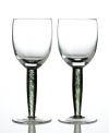 Cool stems swirling with black raise the profile on simply shaped Jet wine glasses. An eye-catching addition to contemporary tables and bold match for the Jet mix-and-match dinnerware from Denby.