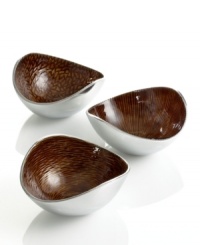 Full of surprises, these handcrafted nut bowls feature sleek, polished aluminum lined with a warm and earthy amber hue. A beautiful set for serving snacks or simply decorating the table. From the Simply Designz collection of serveware and serving dishes. Full of surprises, these handcrafted nut bowls feature sleek, polished aluminum lined with a warm and earthy amber hue. A beautiful set for serving snacks or simply decorating the table. From the Simply Designz collection of serveware and serving dishes.