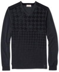 DKNY Jeans takes the traditional houndstooth pattern and the conventional V-neck sweater and turns them into something entirely new: A cotton knit printed with a houndstooth pattern that starts large (around the neck) and then gets smaller and smaller until it fades away (around the waist). DKNY Jeans takes the traditional houndstooth pattern and the conventional V-neck sweater and turns them into something entirely new: A cotton knit printed with a houndstooth pattern that starts large (around the neck) and then gets smaller and smaller until it fades away (around the waist).