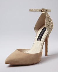 STEVEN BY STEVE MADDEN presents an elegant ankle strap pump with this season's must-have pointed toe, complete with textured studding and glitter-covered suede. STEVEN BY STEVE MADDEN presents an elegant ankle strap pump with this season's must-have pointed toe, complete with textured studding and glitter-covered suede.