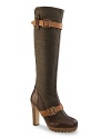 Rugged yet elegant, these tall boots are shapely and chic with twinned straps. By UGG® Collection.