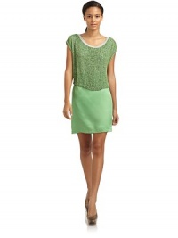 THE LOOKTee trim and liningTiered, sequined bustSolid skirtPullover styleTHE FITAbout 33 from shoulder to hemTHE MATERIALUpper body: rayonLower body: silkFully linedCARE & ORIGINDry cleanImportedModel shown is 5'9 (175cm) wearing US size 2. THE LOOKTee trim and liningTiered, sequined bustSolid skirtPullover styleTHE FITAbout 33 from shoulder to hemTHE MATERIALUpper body: rayonLower body: silkFully linedCARE & ORIGINDry cleanImportedModel shown is 5'9 (175cm) wearing US size 2.