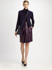Luxurious, rich purple leather in combination with stitched-down pleats make this the perfect style for a polished feminine woman. Front pleatsBack zipLinedAbout 24 longLeatherDry cleanImported of Italian fabricModel shown is 5'11 (180cm) wearing US size 4. Luxurious, rich purple leather in combination with stitched-down pleats make this the perfect style for a polished feminine woman. Front pleatsBack zipLinedAbout 24 longLeatherDry cleanImported of Italian fabricModel shown is 5'11 (180cm) wearing US size 4.