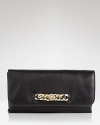 Simple, sophisticated and sized for soirees. MARC BY MARC JACOBS leather clutch is destined to become your new after-hours favorite.