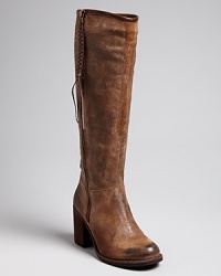 Long on work-a-day Western attitude, these tall boots take a basic approach to the cowgirl trend in distressed, vintage-look suede. Long on work-a-day Western attitude, these tall boots take a basic approach to the cowgirl trend in distressed, vintage-look suede.