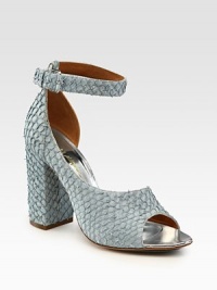 Elegant d'Orsay design in allover textured perch leather with an adjustable ankle strap and extra set of clear straps. Self-covered heel, 4 (100mm)Perch leather and PVC upperIncludes an extra set of clear strapsLeather lining and solePadded insoleImported Elegant d'Orsay design in allover textured perch leather with an adjustable ankle strap and extra set of clear straps. Self-covered heel, 4 (100mm)Perch leather and PVC upperIncludes an extra set of clear strapsLeather lining and solePadded insoleImported