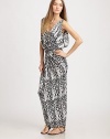 A vivid contrasting graphic print is twisted and elegantly gathered for a sexy, airy effect. V-neckSleevelessWide shoulder strapsCenter gathered bodice for added drapePlunging back with center self-tieHigh-low hemAbout 43 from natural waist94% venezia/6% spandexDry cleanMade in USAModel shown is 5'9½ (176cm) wearing US size Small.