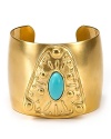 Exotic-inspired jewelry is a chic way to update your wardrobe this season, and T Tahari's turquoise-embellished cuff is a bold way to work the look.